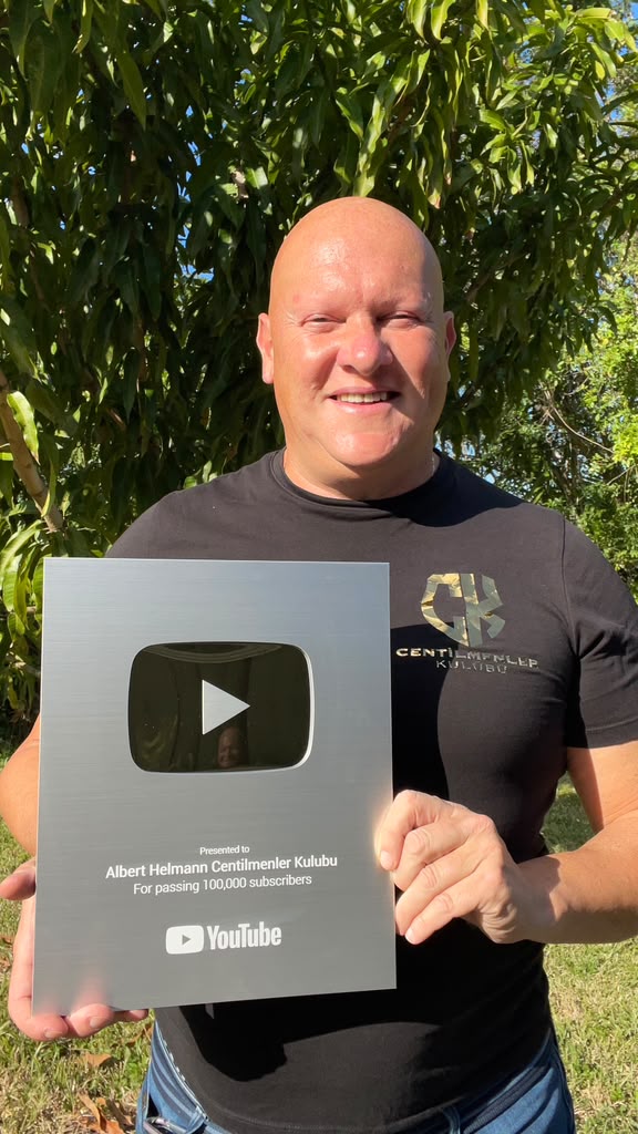 AJ Helmann with his YouTube creator award